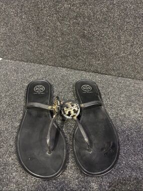 Tory Burch Black Logo Medallion Flat Sandals with Gold Accent
